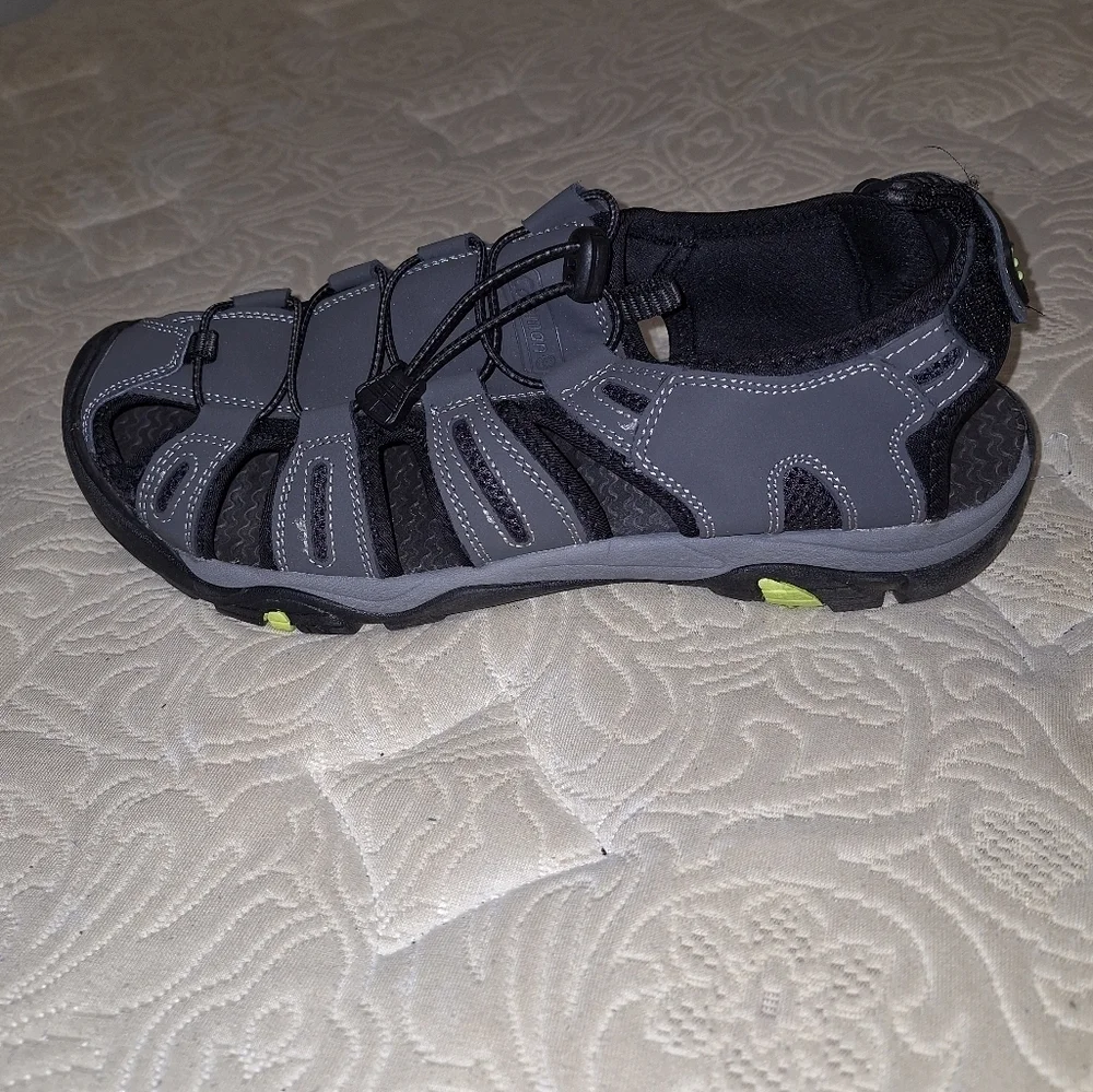 A pair of Coleman George sandals in a men's size 13M. They're in excellent shape